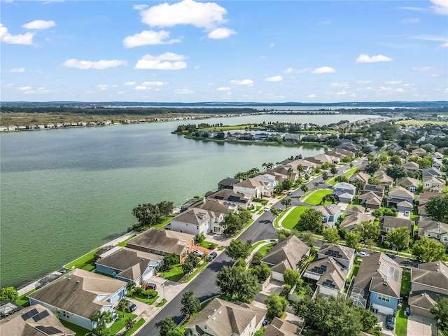 drone / aerial view with a water view