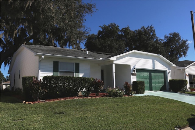 single story home with a garage and a front lawn