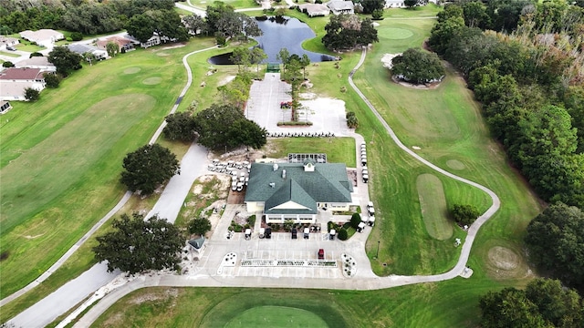 bird's eye view with a water view and golf course view