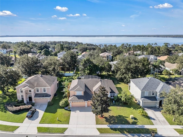 birds eye view of property featuring a water view