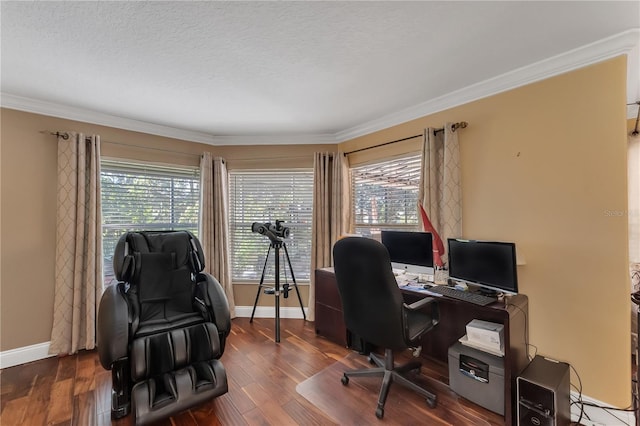 office with a textured ceiling, hardwood / wood-style flooring, a healthy amount of sunlight, and crown molding