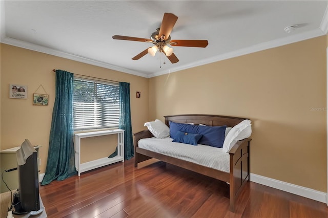 living area featuring crown molding, dark hardwood / wood-style flooring, and ceiling fan