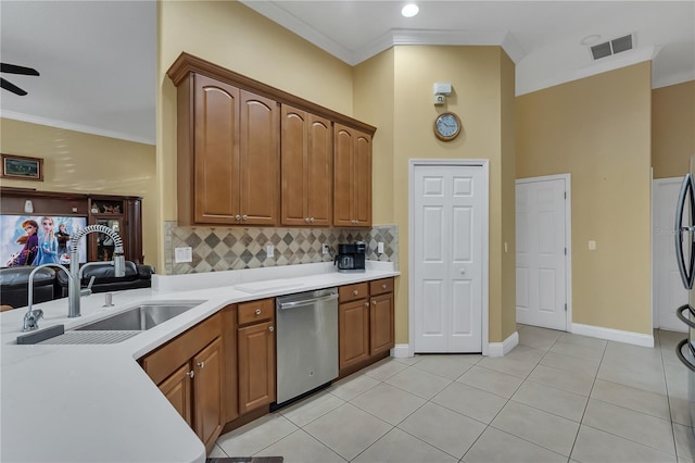 kitchen with decorative backsplash, light tile patterned flooring, stainless steel dishwasher, ornamental molding, and sink