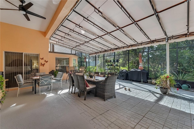 sunroom / solarium with ceiling fan