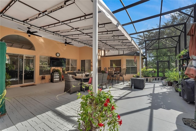 view of patio with a lanai