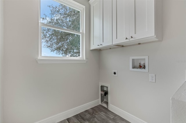 laundry room with cabinets, hookup for an electric dryer, dark hardwood / wood-style floors, and washer hookup