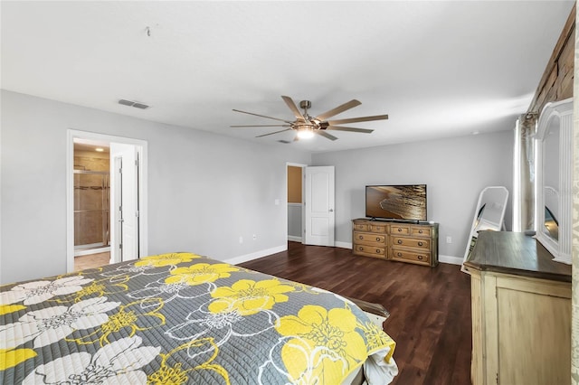 bedroom featuring ensuite bath, ceiling fan, and dark hardwood / wood-style flooring