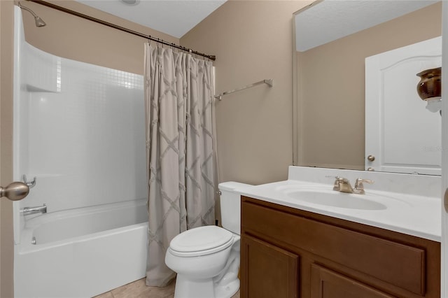 full bathroom featuring shower / bath combination with curtain, tile patterned flooring, vanity, and toilet