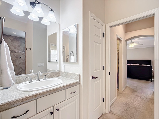 bathroom featuring vanity and ceiling fan