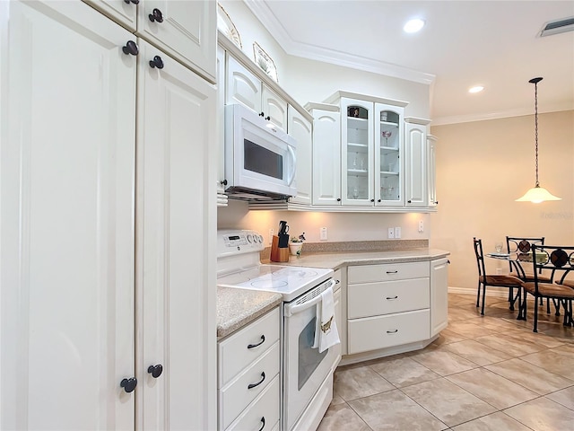 kitchen featuring white cabinetry, crown molding, pendant lighting, and white appliances