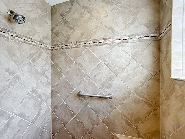 details with a tile shower