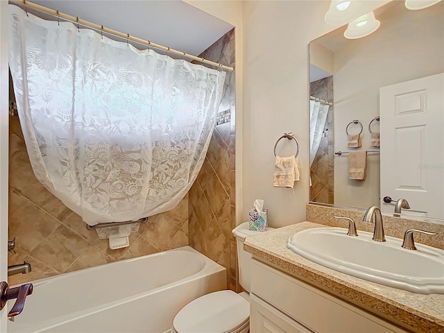 full bathroom with vanity, toilet, and shower / tub combo with curtain