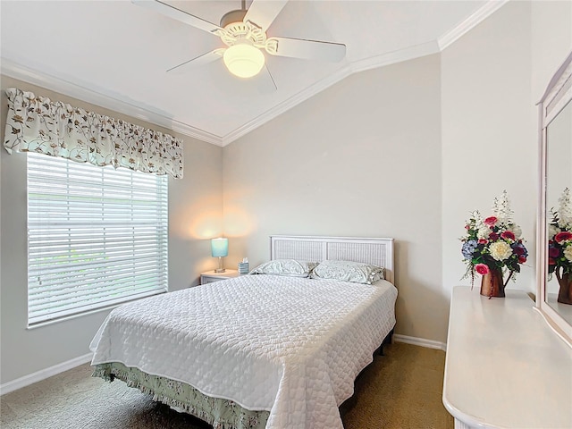 bedroom with ceiling fan, lofted ceiling, ornamental molding, and carpet floors