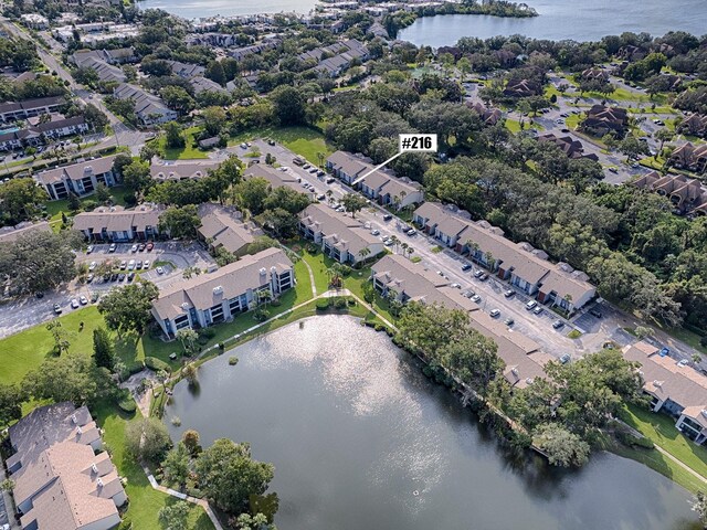 drone / aerial view with a water view