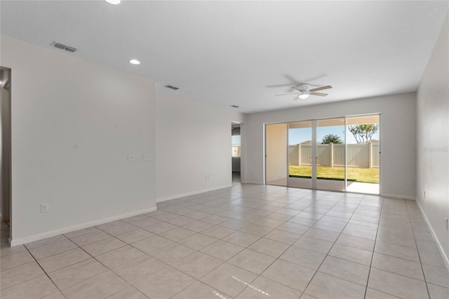 spare room with ceiling fan, recessed lighting, visible vents, and baseboards