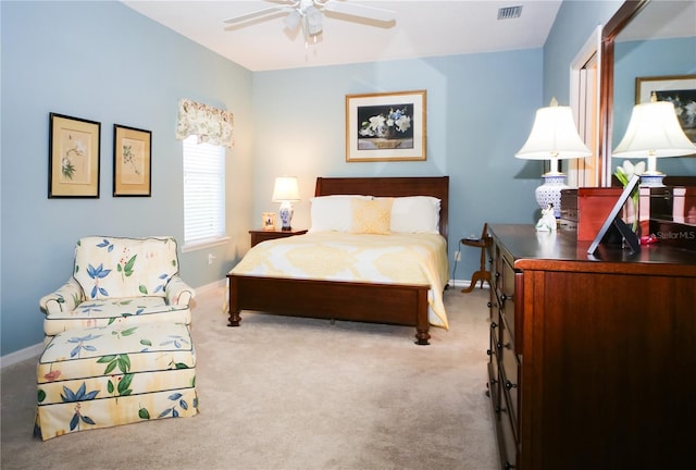 bedroom featuring ceiling fan and light colored carpet