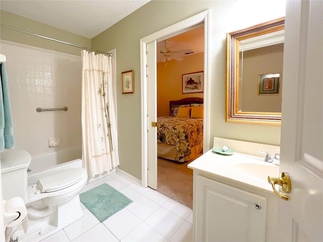 full bathroom featuring ceiling fan, vanity, tile patterned flooring, shower / tub combo, and toilet