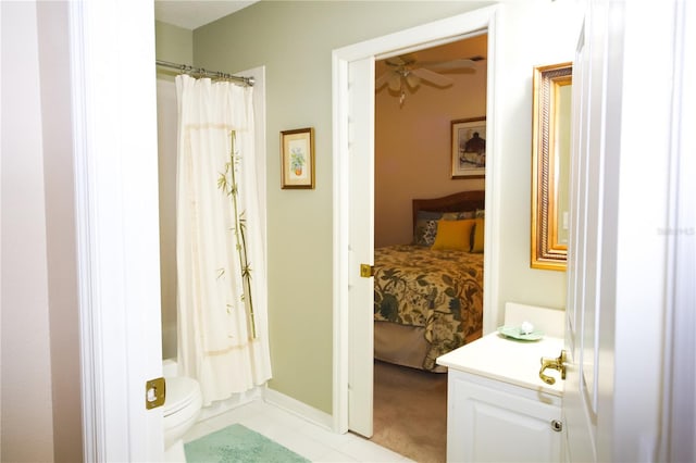 bathroom with a shower with curtain, vanity, and toilet