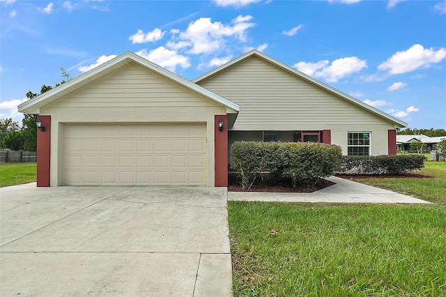 single story home featuring a front yard and a garage