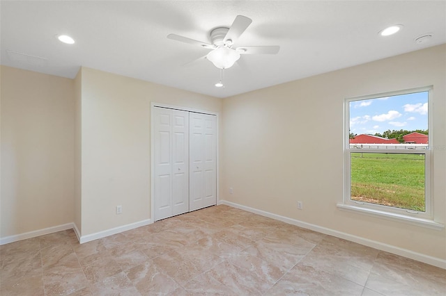 8222 Florida Boys Ranch Rd, Groveland, FL 34736 - unfurnished bedroom featuring baseboards, recessed lighting, and a closet