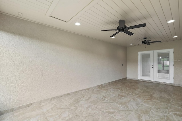 8222 Florida Boys Ranch Rd, Groveland, FL 34736 - empty room with ceiling fan, french doors, recessed lighting, baseboards, and wood ceiling