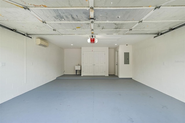 8222 Florida Boys Ranch Rd, Groveland, FL 34736 - garage featuring a wall mounted air conditioner, a garage door opener, electric panel, and concrete block wall