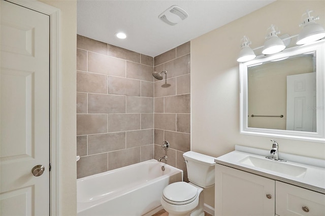 8222 Florida Boys Ranch Rd, Groveland, FL 34736 - bathroom featuring visible vents, shower / washtub combination, vanity, toilet, and recessed lighting