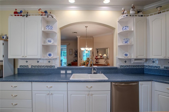 kitchen featuring sink, an inviting chandelier, and white cabinets