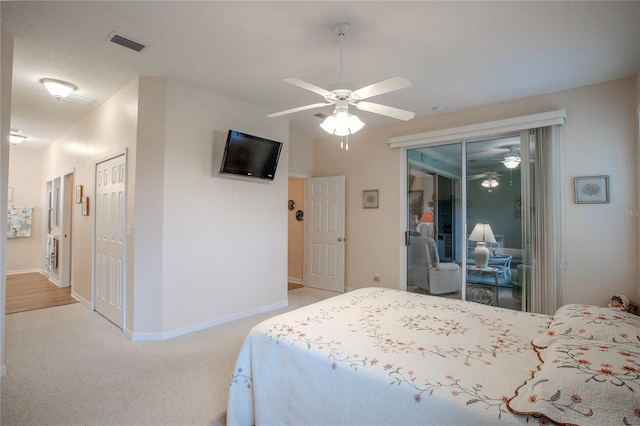 bedroom featuring light carpet, ceiling fan, and access to outside