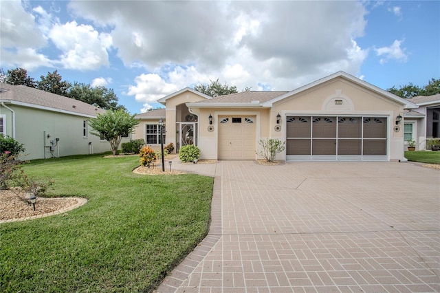 ranch-style home featuring a front yard and a garage