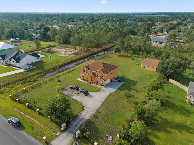 aerial view featuring a rural view and a view of trees