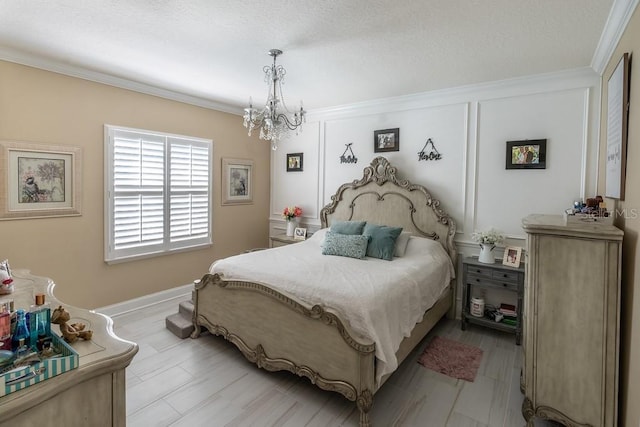 bedroom featuring crown molding and a notable chandelier