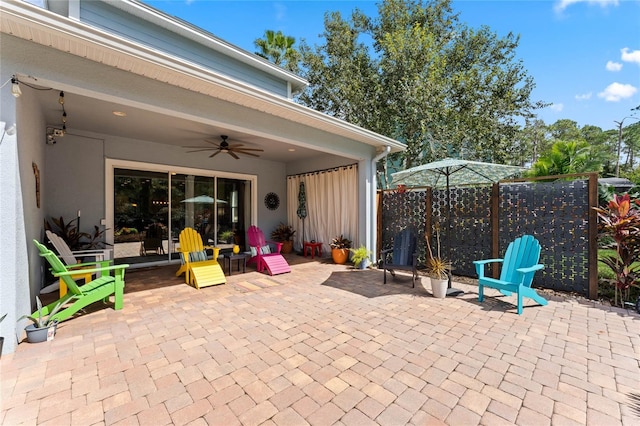 view of patio / terrace featuring ceiling fan