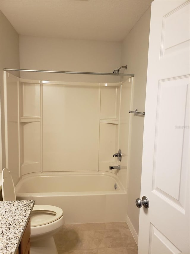 full bathroom featuring toilet, vanity, bathing tub / shower combination, and tile patterned floors