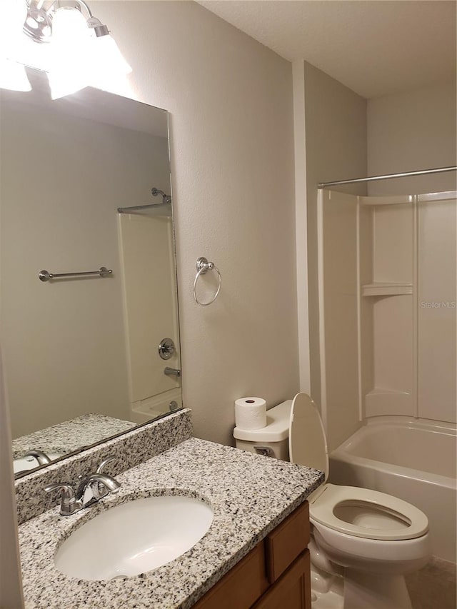 full bathroom featuring vanity, toilet, and bathtub / shower combination