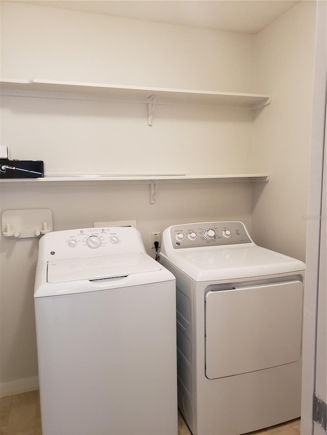 laundry area with washer and clothes dryer