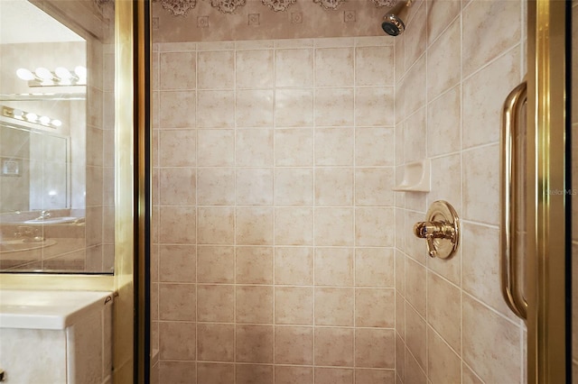 bathroom featuring a shower with shower door