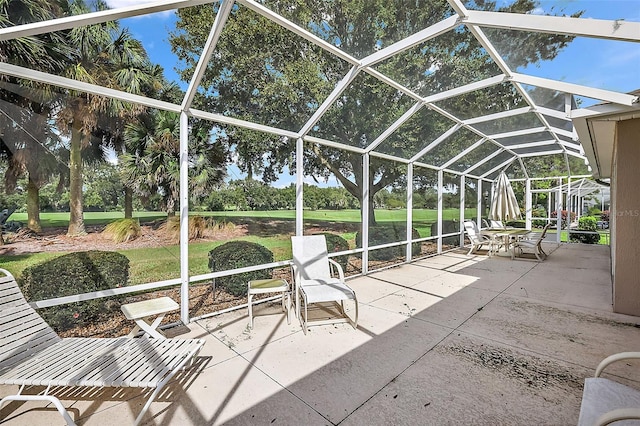 view of patio with a lanai