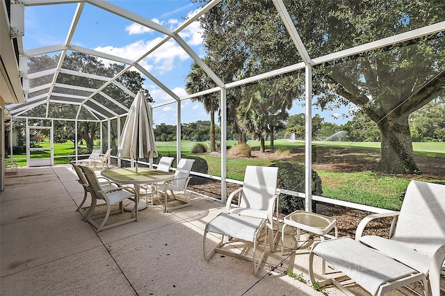 unfurnished sunroom with vaulted ceiling