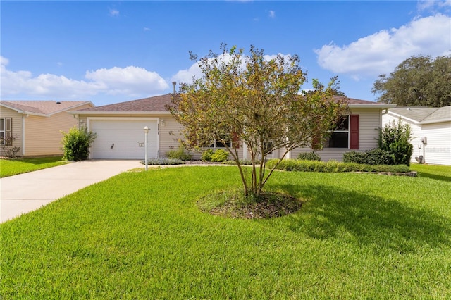 view of front of home with a front yard and a garage