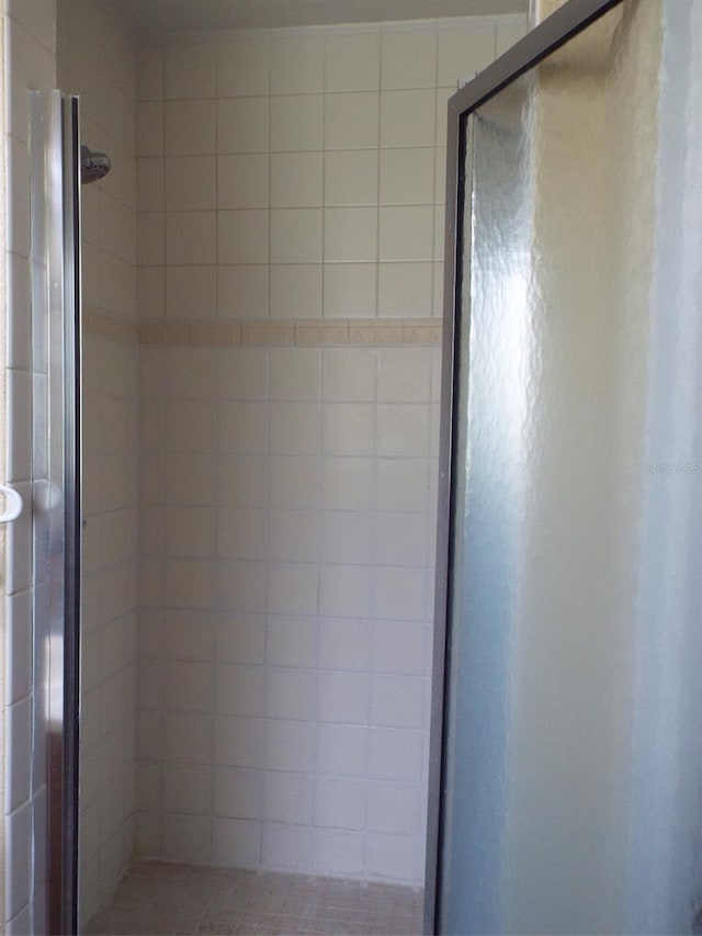 bathroom featuring an enclosed shower