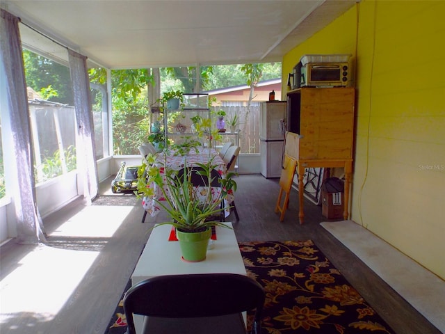 sunroom with plenty of natural light