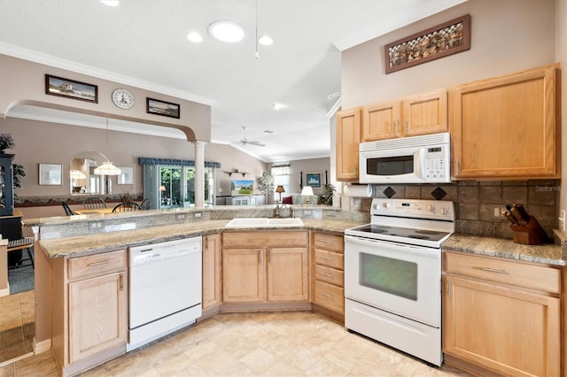 kitchen featuring white appliances, light brown cabinetry, sink, kitchen peninsula, and ceiling fan