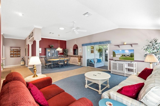 living room with lofted ceiling, ceiling fan, ornate columns, crown molding, and light colored carpet