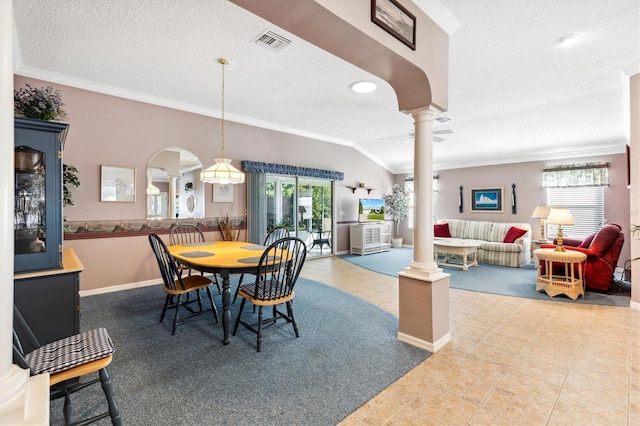 dining room with light carpet, decorative columns, a textured ceiling, and ornamental molding