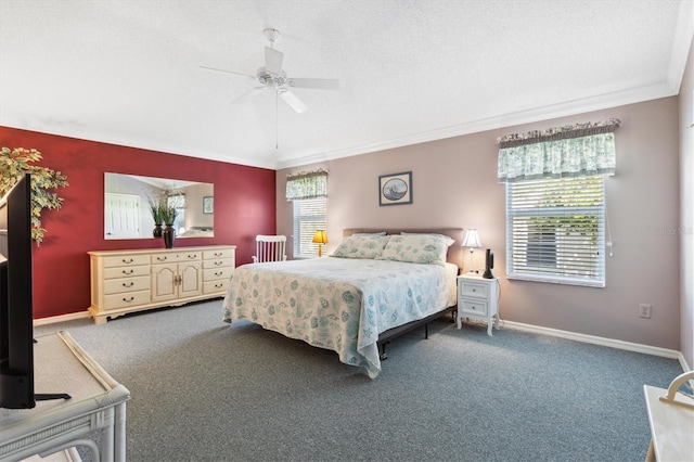 bedroom with ceiling fan, crown molding, a textured ceiling, and carpet floors