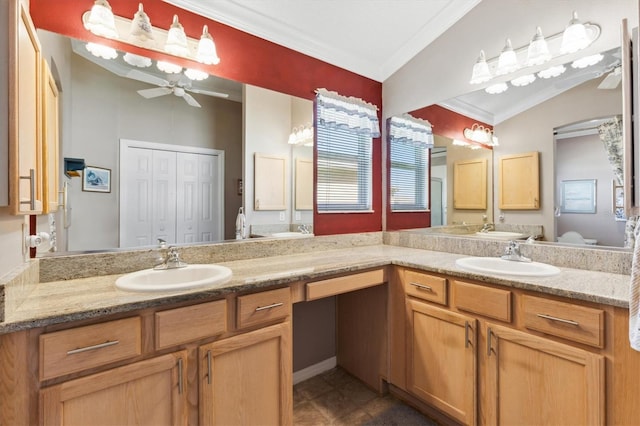 bathroom featuring vanity, ornamental molding, and lofted ceiling