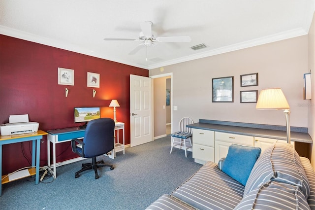 home office with dark carpet, ornamental molding, and ceiling fan