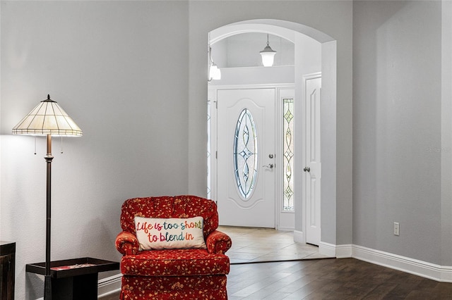 foyer entrance featuring hardwood / wood-style floors