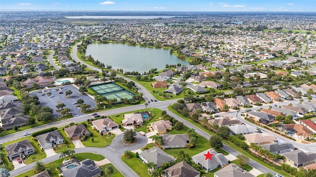 drone / aerial view with a water view